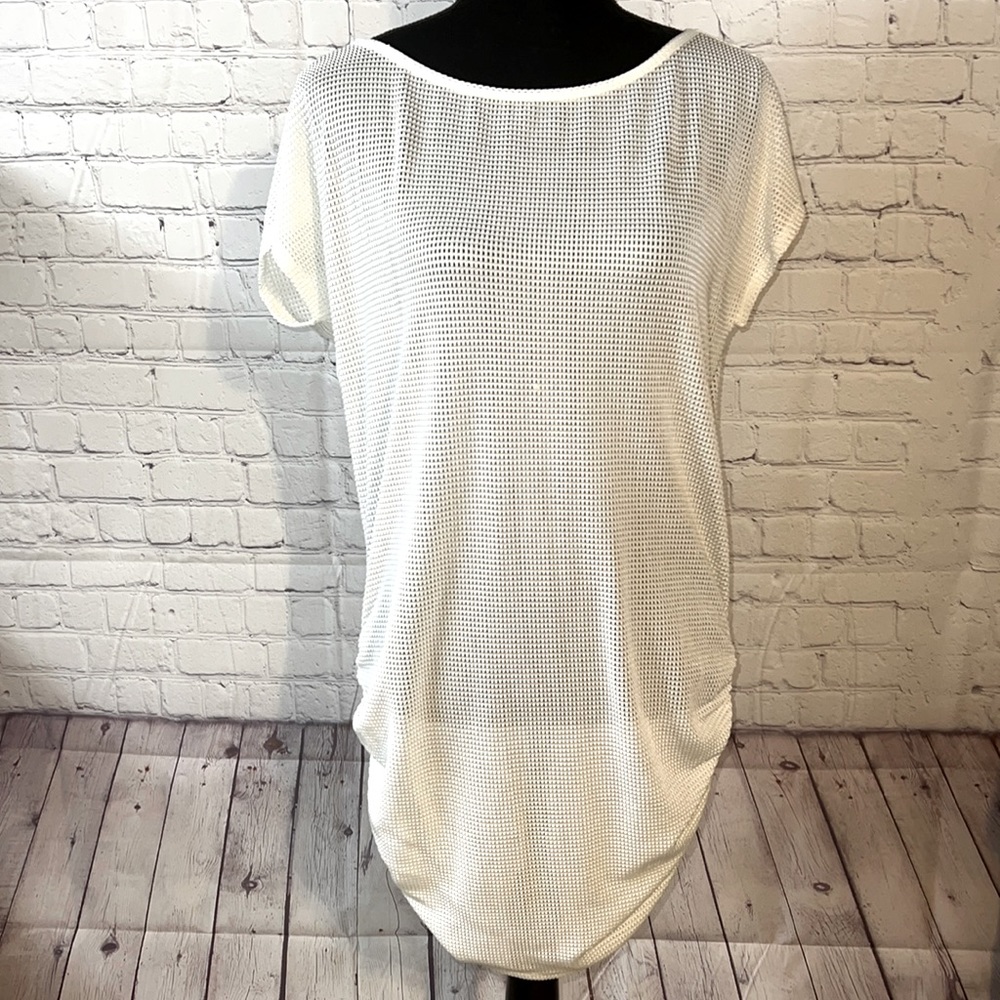 Large mesh short sleeve top by Jordan Taylor. Use as a beach cover up.